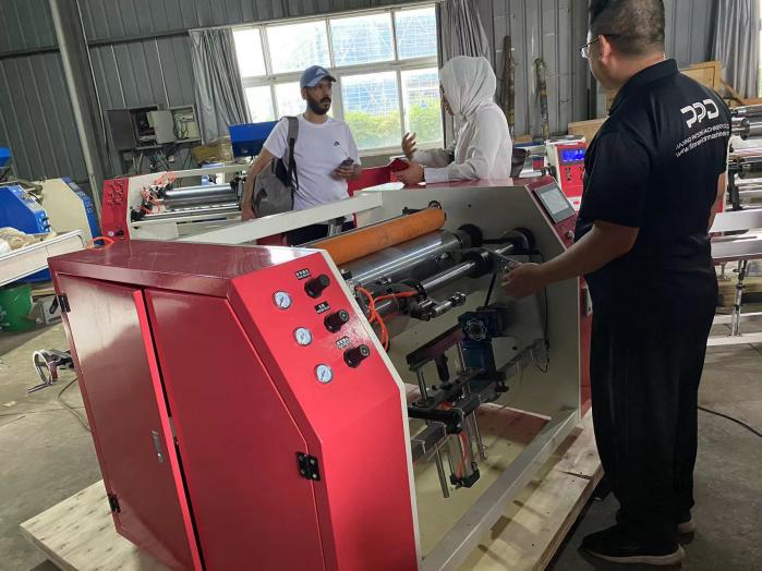 Saudi Arabian Guests Visiting and Purchasing semi-automatic 2-in-1 Rewinder for Aluminum Foil Cling Film