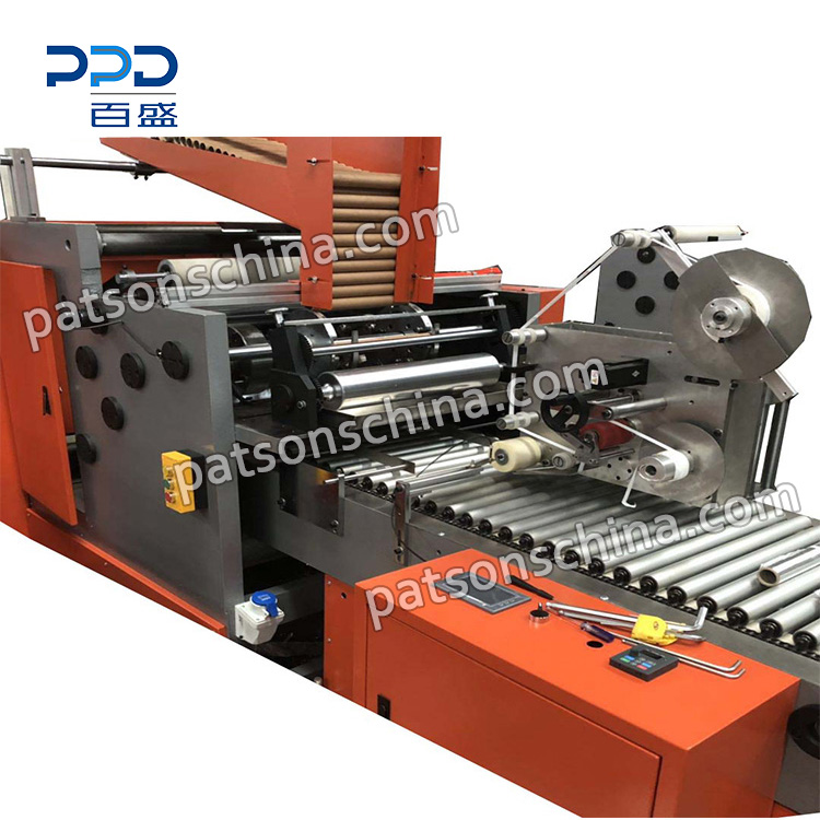 baking paper rewinder with auto sticker.jpg