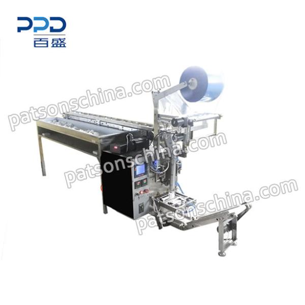 Alcohol cotton ball packaging machine