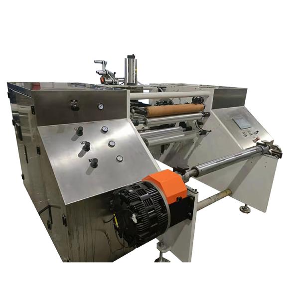 Automatic coreless bakery paper rewinder with automatic labeling and auto arm